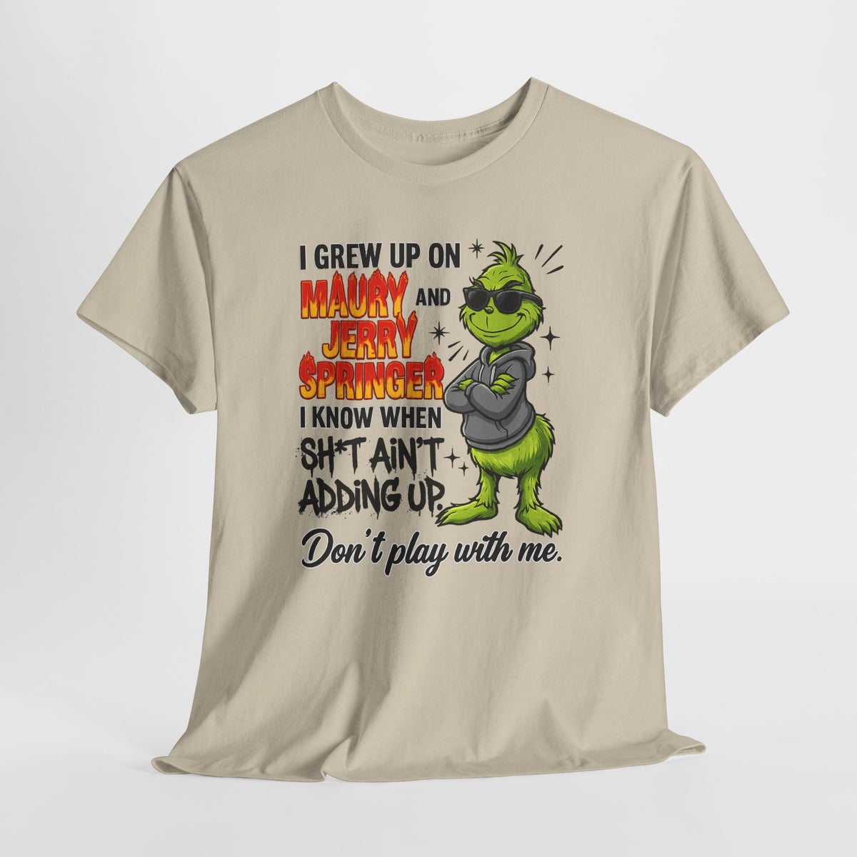 Grinch Cartoon Tee — "I Grew Up on Maury and Jerry Springer" Funny Holiday Shirt