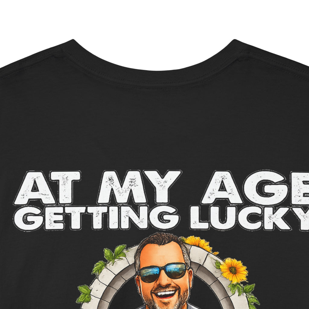 Funny Senior Tee — “At My Age Getting Lucky Means Walking Into a Room and Remembering Why I’m There”