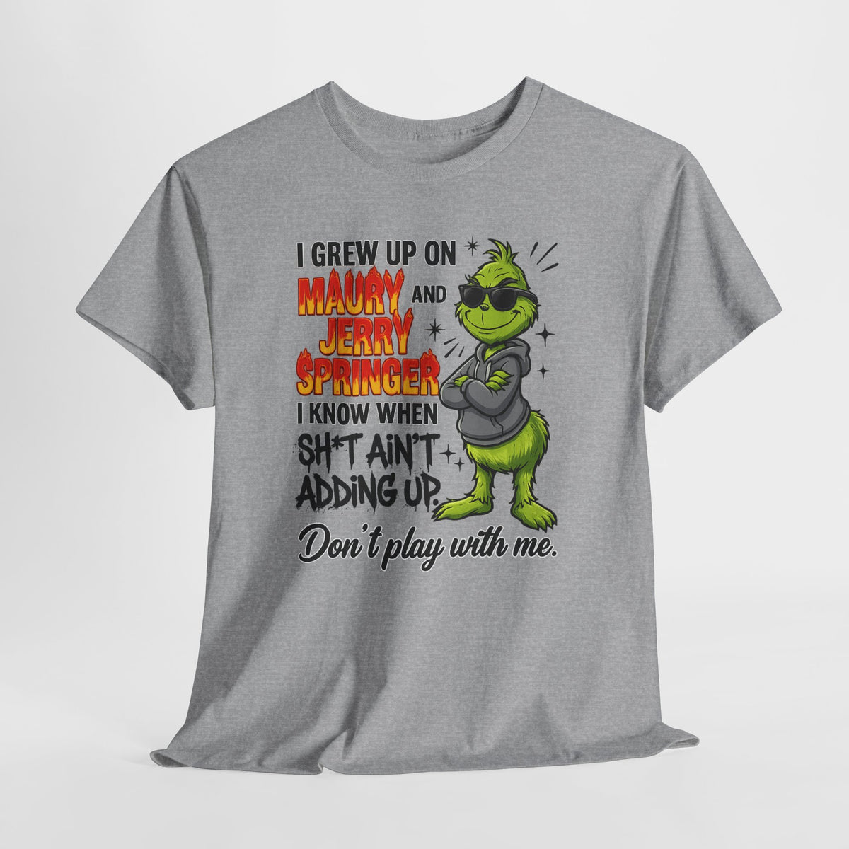 Grinch Cartoon Tee — "I Grew Up on Maury and Jerry Springer" Funny Holiday Shirt