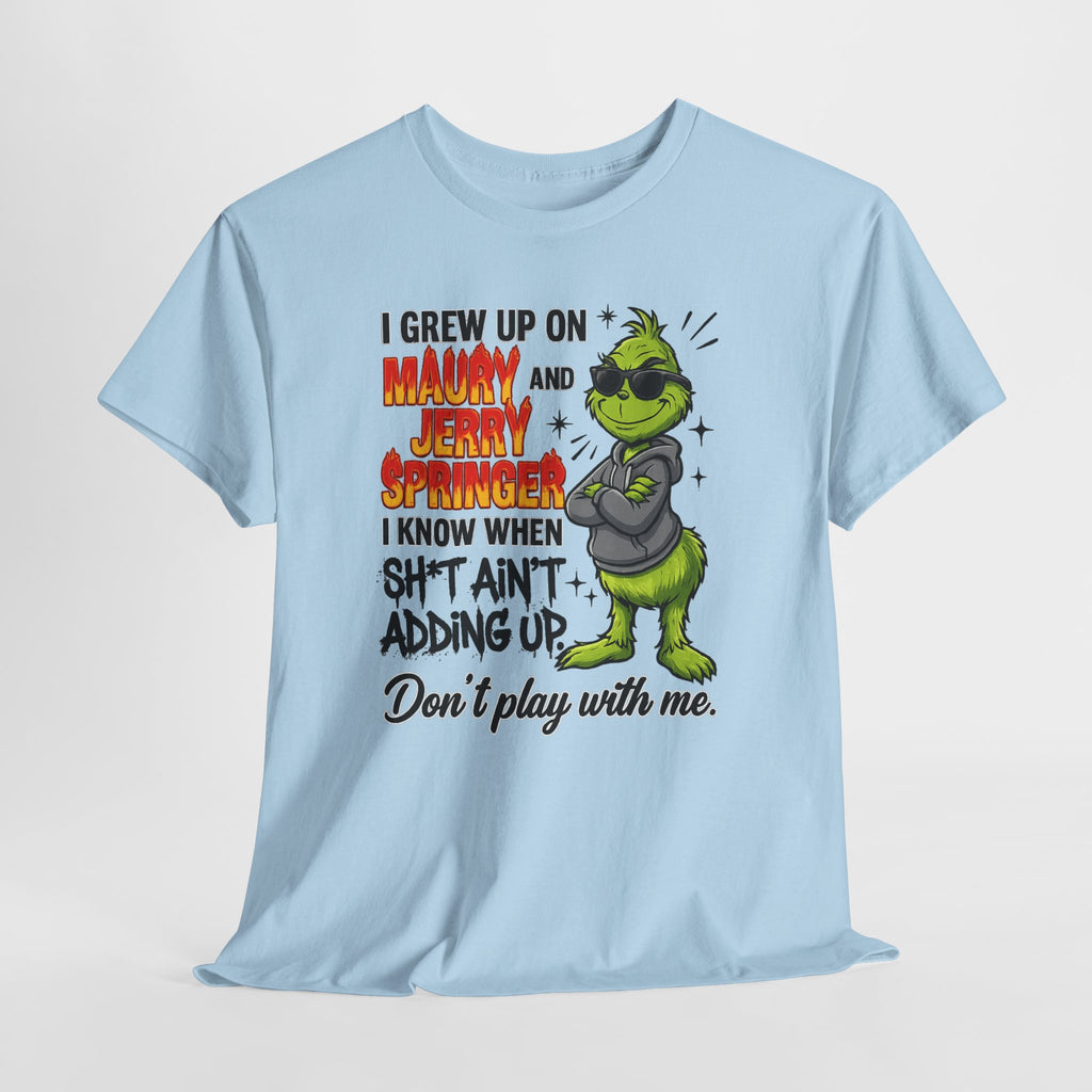 Grinch Cartoon Tee — "I Grew Up on Maury and Jerry Springer" Funny Holiday Shirt