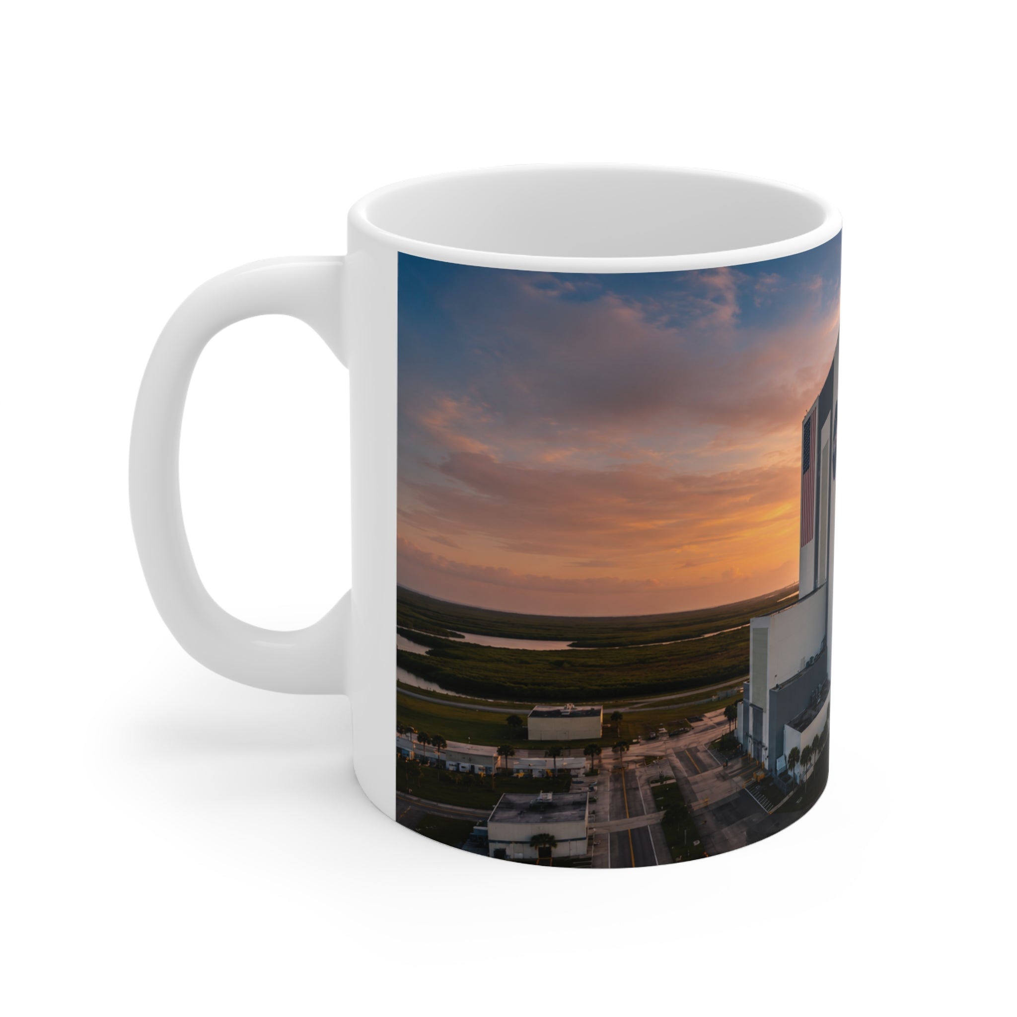 NASA Vehicle Assembly Building Sunrise Photo Mug — American Flag Ceramic Coffee Cup (11oz & 15oz)
