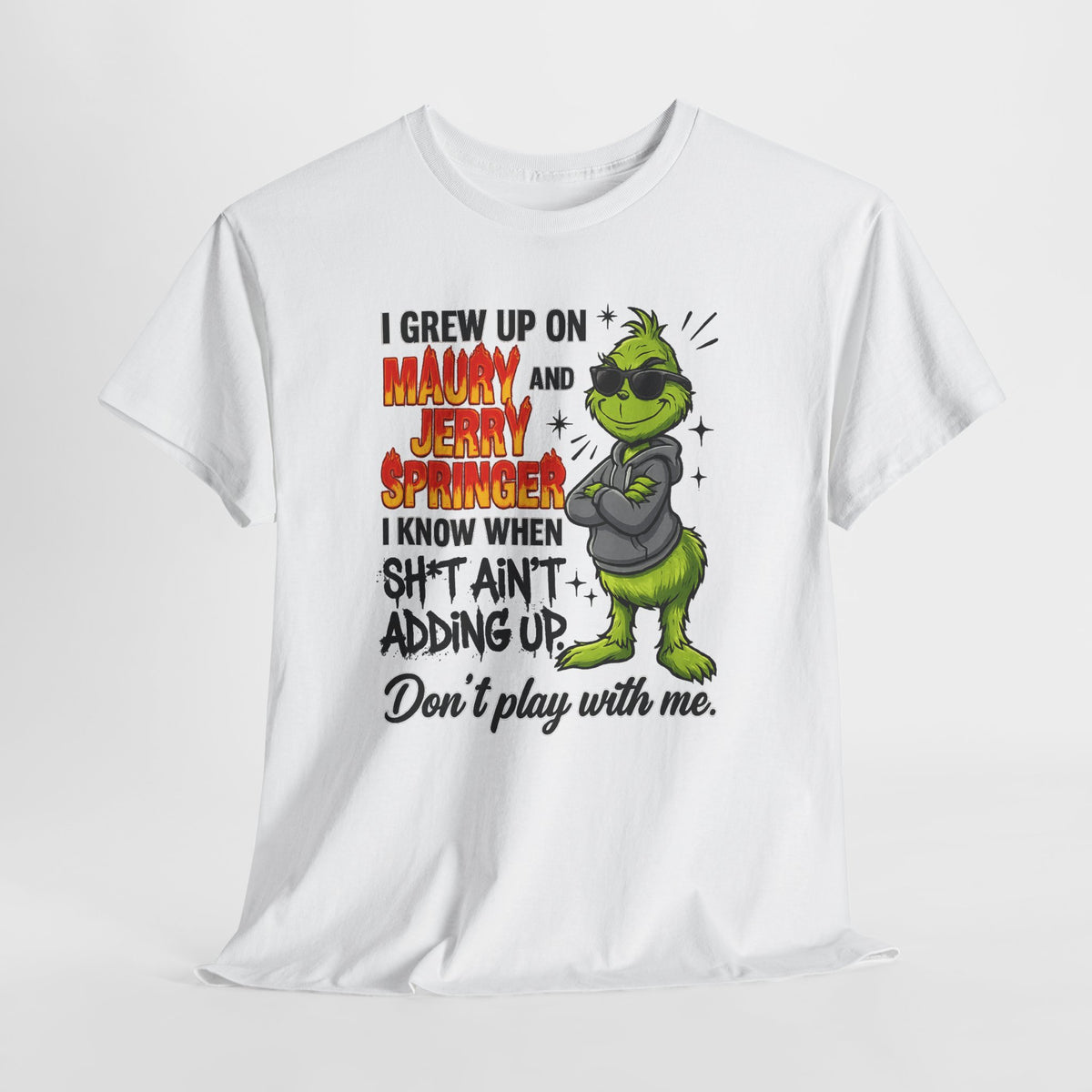 Grinch Cartoon Tee — "I Grew Up on Maury and Jerry Springer" Funny Holiday Shirt