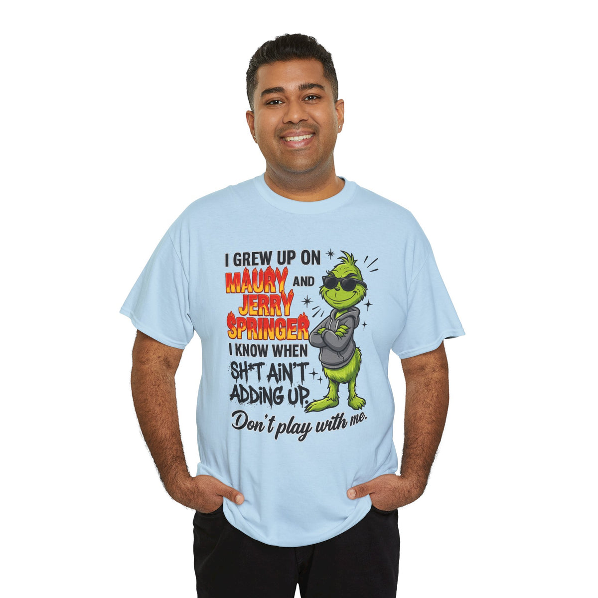Grinch Cartoon Tee — "I Grew Up on Maury and Jerry Springer" Funny Holiday Shirt