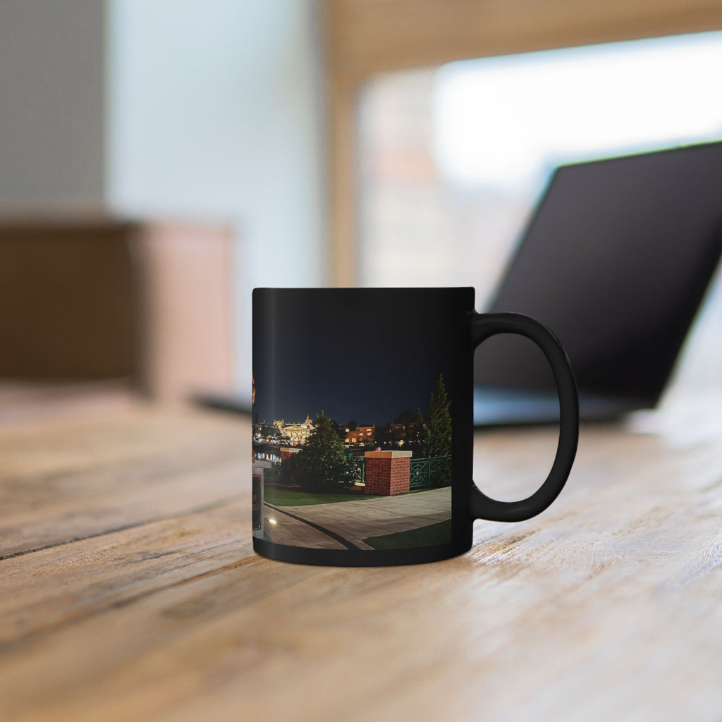 The Simpsons Photo Mug — University Statue & Campus Lights (Black 11oz/15oz)