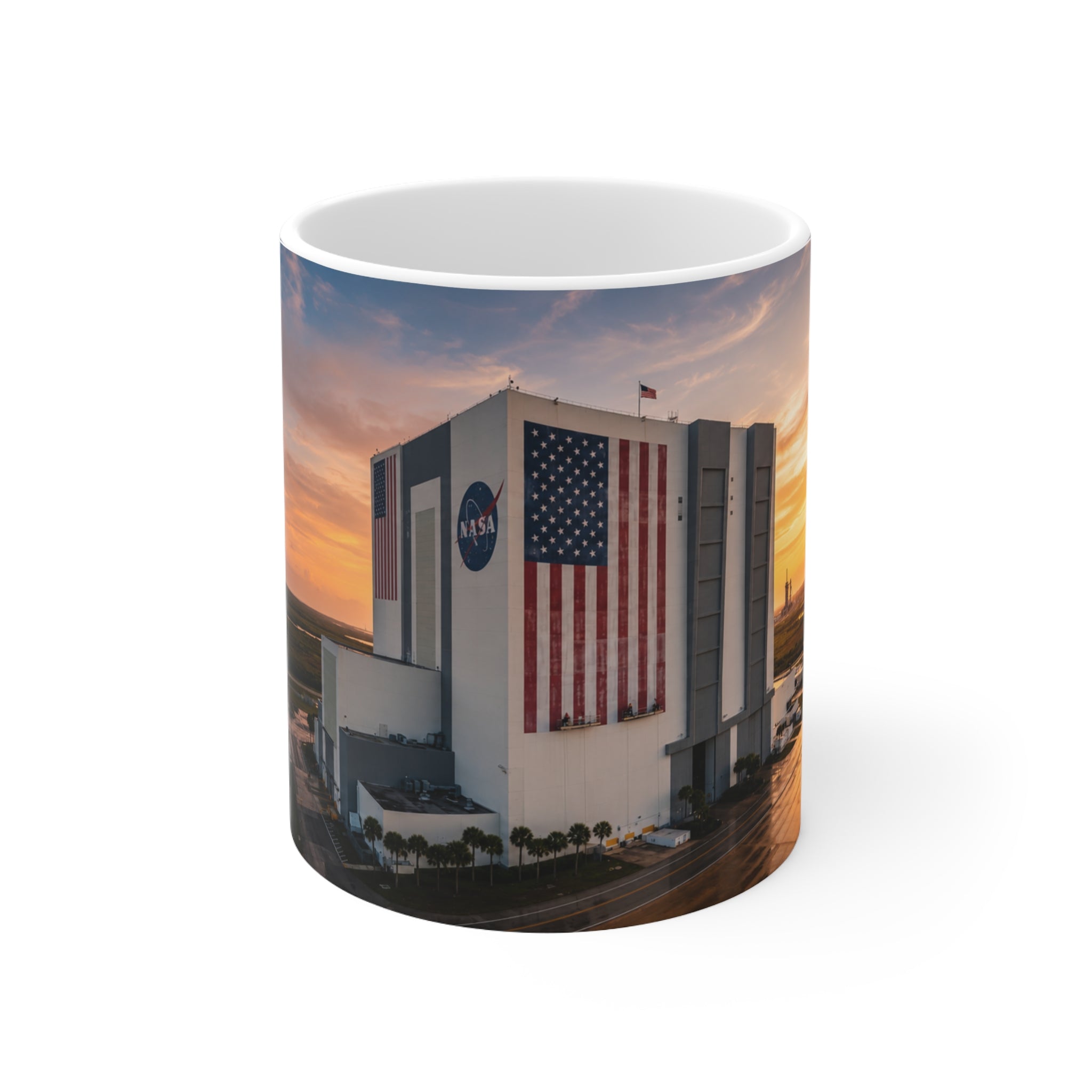 NASA Vehicle Assembly Building Sunrise Photo Mug — American Flag Ceramic Coffee Cup (11oz & 15oz)